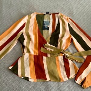 Forever 21 wrap blouse. Size S. New with tags.